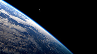 Earth view space plane flying - a view of the earth free wallpaper