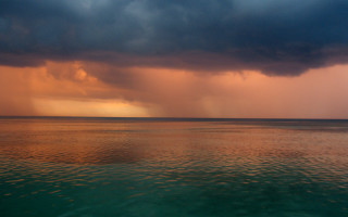 Storm ocean boat dark clouds 2 - a dark cloud in the sky free wallpaper