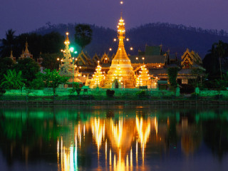 Large building lights water night - a large building free wallpaper for desktop