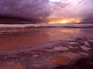 Water sky clouds beach rocks 2 - a sky in the background free wallpaper