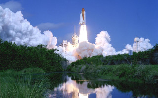 Space shuttle takeoff river clouds 2 - a space shuttle free wallpaper