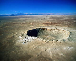 Large crater desert plain mountains 4 - a blue sky above free wallpaper
