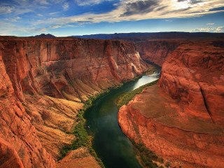 River flowing canyon mountains cliffs - a blue sky above free wallpaper