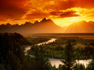 Sunset river mountains trees foreground - a red sky free wallpaper