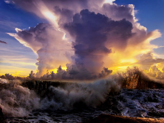 Cloud water waves sunset sky - a sun setting behind free wallpaper