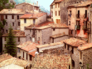 Cityscape clocktower rooftops mountain bridge - romanesque free wallpaper