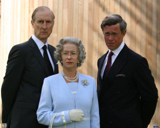 Man woman suits ties standing - promotional free wallpaper