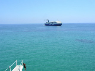 Man dock large boat ocean - him free wallpaper