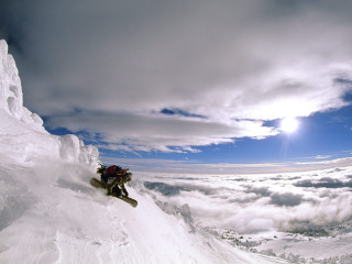 Snowboard man mountains sky sun - a snowboard free wallpaper