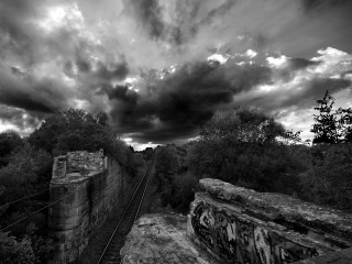 Train track cloudy sky black 4 - tree and bushes free wallpaper