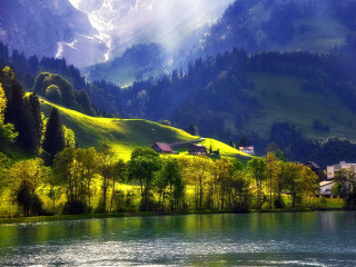 Lake mountains forest trees houses - a mountain range in the background free wallpaper