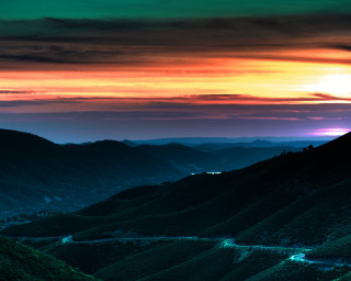 Sunset winding road mountains scenery 2 - a sunset view free wallpaper