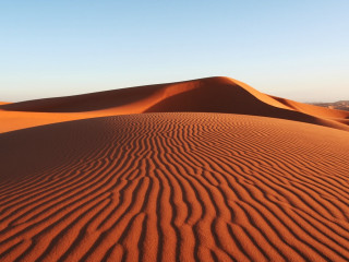 Desert sanddunes blue sky clouds - a few sand free wallpaper