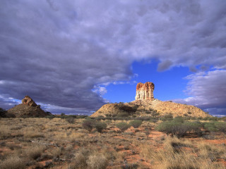 Desert landscape rock formation cloudy 2 - a few bush and bushes free wallpaper