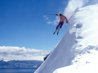 Man flying skis snow mountain - ski free wallpaper for desktop