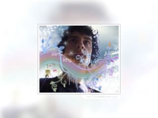 Man curly hair blowing bubble - a bubble free wallpaper