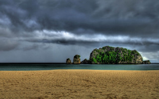 Beach rock formation cloudy sky 6 - stormy weather free wallpaper