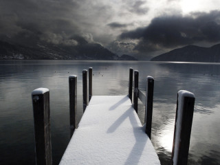 Snow covered dock lake mountains 2 - dark cloud free wallpaper