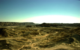 Desert dirtroad mountain sunset blue - a dirt road in the middle of it free wallpaper