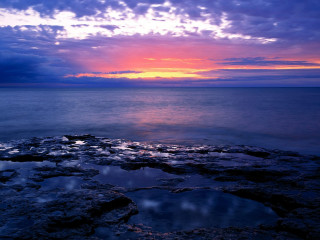 Sunset ocean rocky shore water 4 - a rocky shore free wallpaper