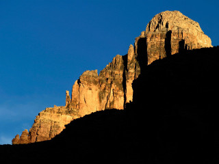 Mountain tall rock formation blue 4 - dramatic light free wallpaper
