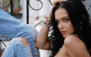 Woman long hair jeans fence - her foot free wallpaper