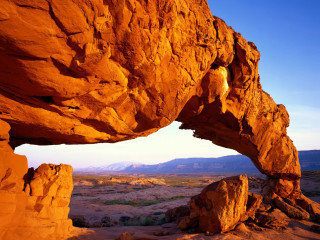 Large rock formation small hole 2 - a large rock formation free wallpaper