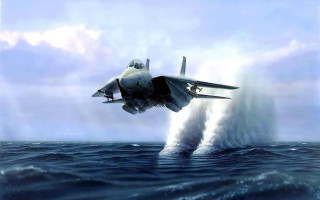 Fighter jet ocean cloudy splash - a jet free wallpaper