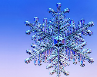 Snowflake blue sky background middle - a snowflake free wallpaper for desktop