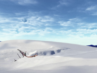 Skiing snowy hill sky clouds - a mountain in the distance free wallpaper