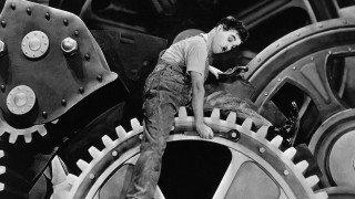 Man working machine factory gears - brassaï free wallpaper