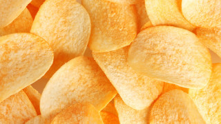 Yellow potato chips closeup hyperrealism - the edge free wallpaper