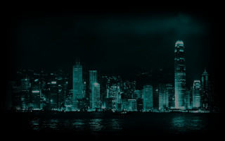 City skyline night water background 5 - a large body of water in front free wallpaper