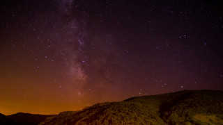 Night sky stars mountain orange - orange glow free wallpaper