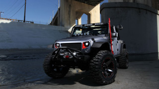 Jeep big tire front bridge - under a bridge free wallpaper