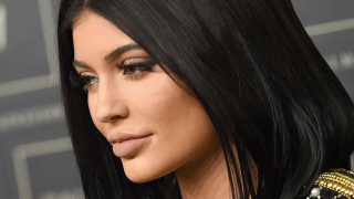 Black hair gold dress symmetrical - necklace free wallpaper