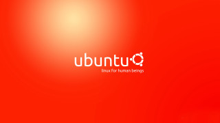 Red wall white ubuntu logo - dark background free wallpaper