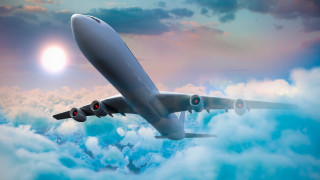 Jetliner cloudy sky above sunset - a cloudy sky above the clouds free wallpaper