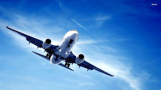 Jetliner flying blue sky clouds 3 - turnaround free wallpaper