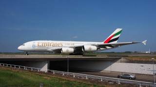Large white airplane runway fence 2 - a large white airplane free wallpaper