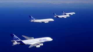 Four airplanes flying blue sky - a group free wallpaper for desktop