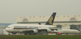 Large white airplane runway airport - a large white airplane free wallpaper