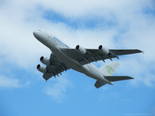 Large jet cloudy sky green - a large passenger free wallpaper