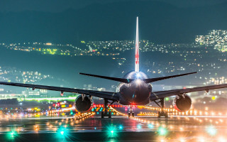Jetliner night sky runway lights - a large jetliner free wallpaper