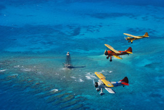 Three planes blue ocean corals - alson s. clark free wallpaper