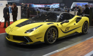 Yellow sports car display people - side profile free wallpaper