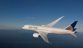 United airlines plane flying blue - side profile free wallpaper