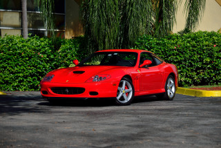 Red sports car parking lot 20 - a yellow sign free wallpaper