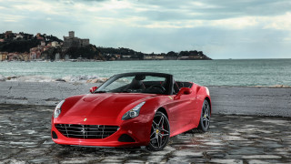 Red sports car cobblestone road - bernardo cavallino free wallpaper