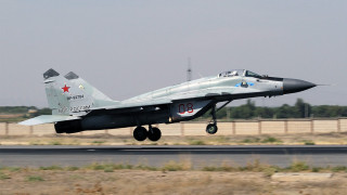 Fighterjet takeoff airport fence sky - front view free wallpaper